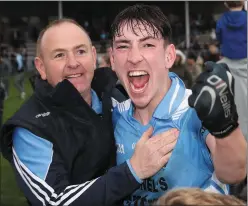  ??  ?? Fergal Donohoe celebrates with his dad John after the final whistle on Sunday.