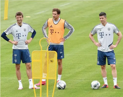  ?? Agence France-presse ?? ↑
Bayern Munich’s players attend a training session ahead of their clash against Borussia Dortmund in Munich.