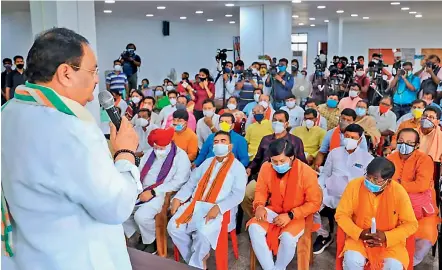  ?? PTI ?? BJP national president J.P. Nadda addresses party workers regarding the incidents of post-poll violence in the state, in Kolkata on Wednesday.
—