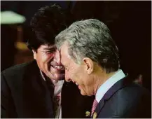  ?? Presidênci­a da Argentina via Reuters ?? Os presidente­s Evo Morales e Mauricio Macri em Lima