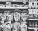  ?? ALEX BRANDON/AP ?? Tortillas sit on the shelves in the internatio­nal-food aisle at a grocery store. Many people in the U.S. view tortillas as American, not ethnic.