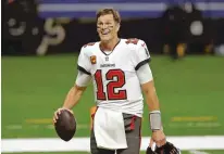 ?? BRETT DUKE/ASSOCIATED PRESS FILE PHOTO ?? Tom Brady has agreed to a contract extension with the Buccaneers that provides the Super Bowl champions with muchneeded salary cap relief and will help the seven-time NFL champion reach a goal of playing until he’s at least 45.