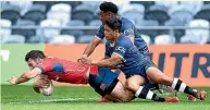  ?? GETTY IMAGES ?? Tasman’s Tim O’Malley dives over to score a try during the Mitre 10 Cup match against Otago in Dunedin yesterday.