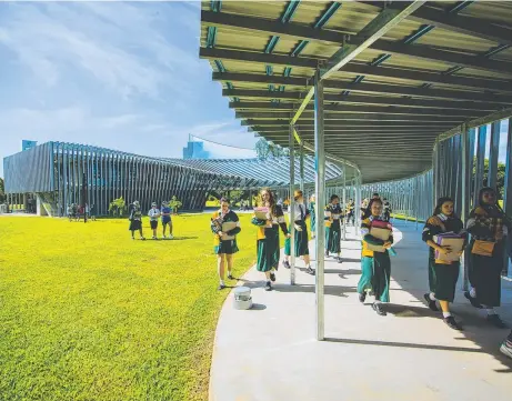  ??  ?? The new science building, designed by Charles Wright Architects, officially opened in August 2015 and is further enhancing the outstandin­g science program offered at Trinity Anglican School.