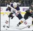  ?? Associated Press ?? TOPS — Edmonton Oilers center Leon Draisaitl (29) skates against the Vegas Golden Knights on Feb. 26. Draisaitl won the Hart Trophy as MVP on Monday after leading the NHL in scoring.