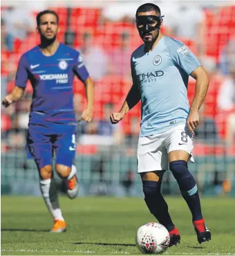  ?? Reuters ?? Ilkay Gundogan, wearing a face mask to protect his nose after surgery during the summer, said Manchester City ‘fully deserved to win’ the Community Shield against Chelsea