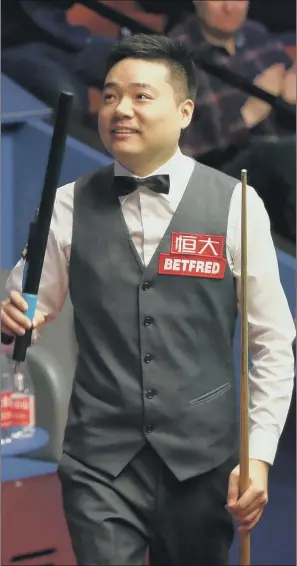  ?? PICTURE: PA ?? HAPPY DAYS: Ding Junhui enjoyed his first-round win over compatriot Xiao Guodong at the Crucible yesterday to set up a second-round encounter with either Anthony McGill or Ryan Day at the weekend.