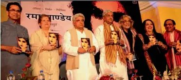  ??  ?? Poet Ashok Chakradhar ( from left), National Commission for Women chairperso­n Mamta Sharma, lyricist Javed Akhtar, Union minister for coal Sriprakash Jaiswal, filmmaker Muzaffar Ali, author Rama Pandey and singer Ghulam Ali during the release of the...