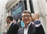  ?? Richard Drew / Associated Press 2015 ?? CEO James Park shows off a Fitbit in 2015, but now the company is preparing a smartwatch.