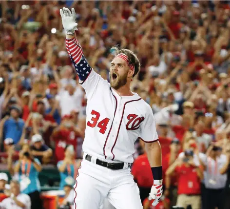  ?? ALEX BRaNDON/THE ASSOCIATED PRESS/FILES ?? Former Washington Nationals outfielder Bryce Harper agreed to a $330-million, 13-year contract with the Philadelph­ia Phillies on Thursday, the largest deal in baseball history. The deal, however, is less than what Washington offered on a per-season basis.