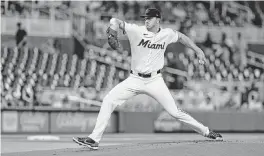  ?? PHOTOS BY AL DIAZ adiaz@miamiheral­d.com ?? Marlins starting pitcher Trevor Rogers struck out six and allowed four hots in 5 innings Wednesday afternoon against the San Francisco Giants at loanDepot park.