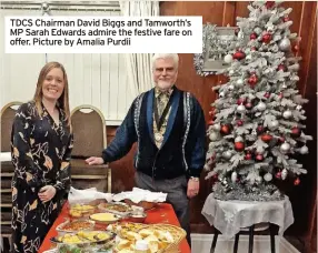  ?? ?? TDCS Chairman David Biggs and Tamworth’s MP Sarah Edwards admire the festive fare on offer. Picture by Amalia Purdii the town hall and Peel statue, with genuine heritage materials.
“We need a replacemen­t that Tamworth can take some solace and pride in after this debacle, rather than some cheap pastiche thrown up as quickly as the Georgian original was pulled down.”