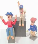  ?? VALE CRAFT GALLERY ?? Scuplture of Cubs fans by Steve Rebora. |