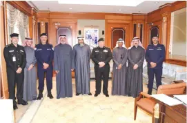  ??  ?? KUWAIT: Interior Ministry’s Undersecre­tary Lieutenant General Suleiman Al-Fahad yesterday honored Staff Sergeant Adel Ali from the Traffic General Department who was injured in line of duty while chasing and arresting a reckless driver. Lt Gen Fahad...