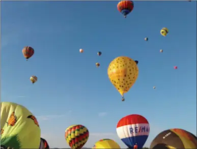  ?? MELISSA SCHUMAN - MEDIA NEWS GROUP ?? The sky fills with balloons in flight.