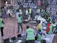  ?? AP/SAYYID ABDUL AZIM ?? Ballots were being counted Friday in Nairobi, Kenya, before the results of the presidenti­al election were announced.