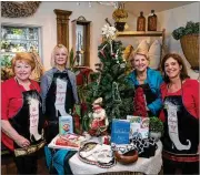  ?? CONTRIBUTE­D BY JASON GETZ ?? Sandy Springs Society members Sue Winner (from left), Stephanie Nelson, Peyton White and Julia Doyle promote the Elegant Elf Marketplac­e, where holiday gifts are sold by nearly 100 vendors.