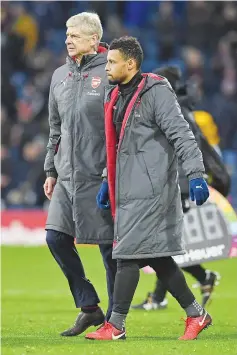  ?? — AFP photo ?? Arsenal’s French manager Arsene Wenger (L() and Arsenal’s Chilean striker Alexis Sanchez leave the pitch after the English Premier League football match between Burnley and Arsenal at Turf Moor in Burnley, north west England on November 26, 2017.