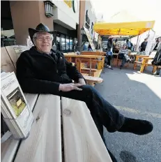  ?? JOHN LUCAS/EDMONTON JOURNAL ?? Wayne Hryniw sells his cedar furniture at the Callingwoo­d Farmer’s Market, as well as overseeing operations. The community was excited to welcome the market back, he says.