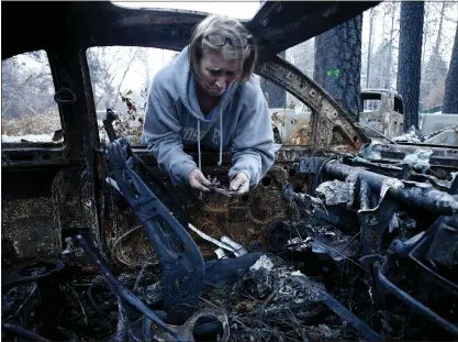  ?? ALL PHONE SCREEN PHOTOS COURTESY TAMRA FISHER; PHOTOS BY KARL MONDON — STAFF PHOTOGRAPH­ER ?? Tamra Fisher, who found her car weeks after the fire, posted a chilling 25-minute-long video of her screams and curses as she escaped.