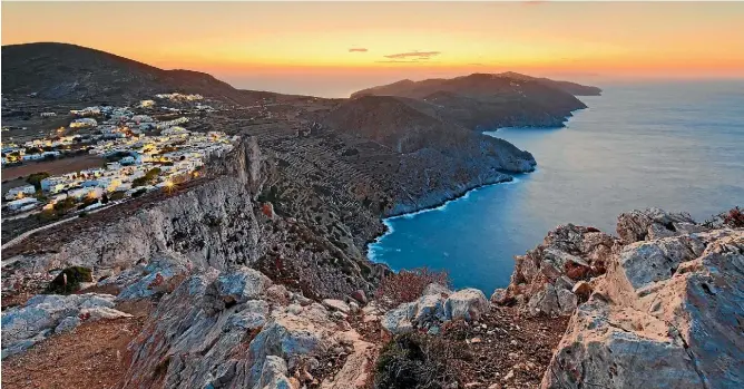  ?? ISTOCK ?? Just 650 lucky Greeks call Folegandro­s, which lies close to Santorini and Milos, home.