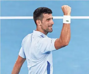  ?? MIKE FREY/USA TODAY SPORTS ?? Novak Djokovic celebrates his 6-0, 6-0, 6-3 victory over Adrian Mannarino of France in the fourth round at the Australian Open.