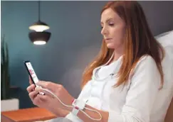  ?? MASIMO ?? As part of a new pilot, patients with mild COVID-19 symptoms can be discharged home from University Hospitals with a pulse oximeter and remote monitoring app.