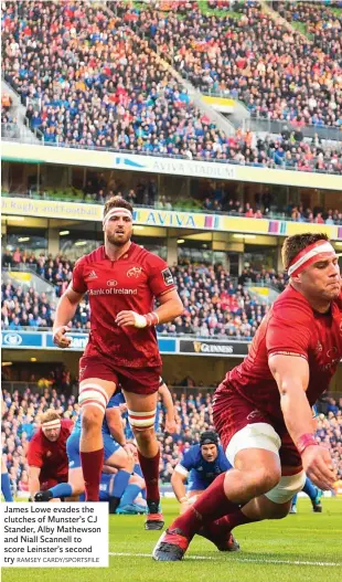  ?? RAMSEY CARDY/SPORTSFILE ?? James Lowe evades the clutches of Munster’s CJ Stander, Alby Mathewson and Niall Scannell to score Leinster’s second try