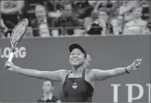  ?? The Associated Press ?? FIRST FINAL: Naomi Osaka celebrates Thursday after defeating Madison Keys in the semifinals of the U.S. Open in New York.