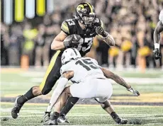  ?? JEFFREY BECKER USA TODAY Sports ?? Iowa tight end Erick All sustained a season-ending ACL tear in October, and played only three games for Michigan in 2022 because of a back injury.