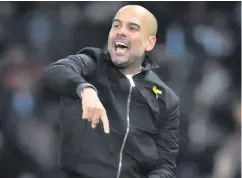  ??  ?? Rules: Manchester City boss Pep Guardiola has called for stricter refereeing