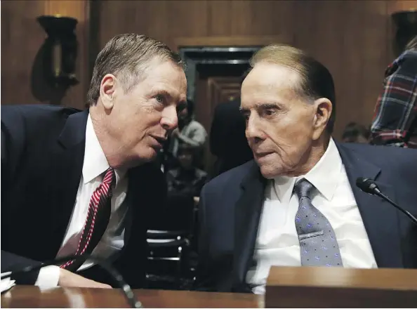  ?? MANUEL BALCE CENETA/THE ASSOCIATED PRESS ?? U.S. Trade Representa­tive-nominee Robert Lighthizer, left, talks to former senator Bob Dole during his confirmati­on hearing on Capitol Hill in Washington on Tuesday. Lawmakers demanded aggressive action on Canada over trade issues.