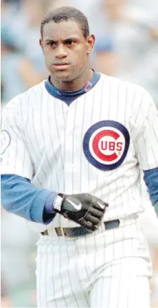  ?? DANIEL LIPPITT/AFP/GETTY IMAGES/FILES ?? Sammy Sosa is one of the steroid-tainted sluggers whose career stats would merit induction into the Cooperstow­n, N.Y., museum — including 609 homers and 1,667 RBIs.
