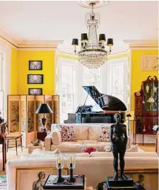  ?? Rizzoli / Stacey Bewkes ?? The wall color in this room is a nod to the famous yellow walls of Nancy Lancaster, the Virginian-turned Brit once dubbed the woman with “the finest taste of anyone in the world.”