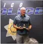  ?? ?? Former Chico police officer Dave Richardson speaks after receiving his badge at the Chico Fire Training Center in Chico on Thursday. The badge replaces the one Richardson lost in the 2018 Camp Fire.