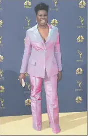  ?? Allen J. Schaben Los Angeles Times ?? SILVER OR PINK? Leslie Jones chose a custom iridescent pantsuit designed by Christian Siriano.