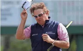  ?? ASSOCIATED PRESS ?? William McGirt tips his hat after finishing up his 69 on the 18th hole during the first round. He’s currently in second place.