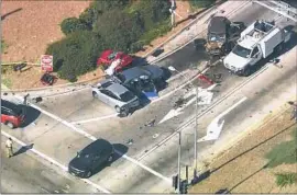  ?? KTLA-TV Channel 5 ?? A KIA driven by an underage suspect caused a crash involving three other cars as it left the 105 Freeway at Central Avenue on Thursday afternoon, authoritie­s said.