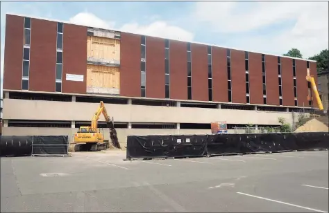  ?? Ned Gerard / Hearst Connecticu­t Media ?? A view of the property at 65 Main St. in Ansonia in June 2020. The property is currently being renovated to house the new headquarte­rs for Ansonia police and a new senior center.