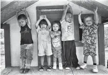  ?? DON UNSER FOR SEARCHLIGH­T NEW MEXICO ?? Children in the Cuidando Los Niños Preschool in Albuquerqu­e, 2001.