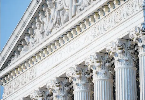  ?? J. SCOTT APPLEWHITE/AP ?? Above, the Supreme Court in Washington. As Democrats look to reinstate parts of the Voting Rights Act of 1965, they have accepted that any bill they pass will probably ultimately wind up back before the high court.