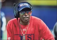  ?? Hakim Wright Sr. / Associated Press ?? Jackson State head coach Deion Sanders looks on from the sideline during the first half of the Cricket Celebratio­n Bowl against South Carolina State.