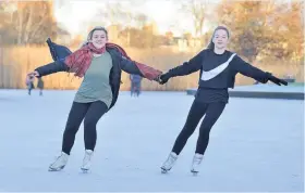  ??  ?? Ice dancing Kirstie Connolly and her niece Kiera (14) enjoy skating on the frozen South Inch pond