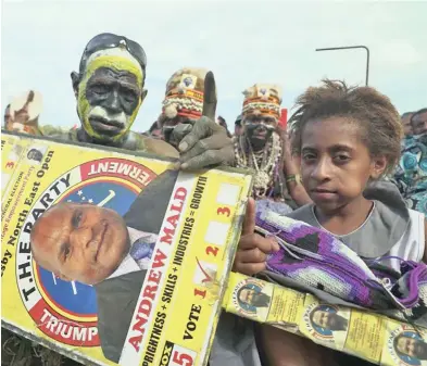  ?? Photo: AFP ?? Supporters at Port Moresby, Papua New Guinea.