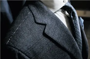  ??  ?? Twenty-five hands contribute 33,000 stitches to each luxury Kiton jacket from Italy.