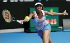  ?? VINCENT THIAN — THE ASSOCIATED PRESS ?? United States’ Venus Williams reaches for a return to Switzerlan­d’s Belinda Bencic during their first round match at the Australian Open tennis championsh­ips in Melbourne, Australia, Monday.