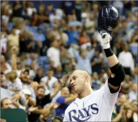  ?? MIKE CARLSON — THE ASSOCIATED PRESS FILE ?? In this Sept. 18, 2008photo the Tampa Bay Rays’ Evan Longoria makes a curtain call in the seventh inning as fans applaud his third home run of the baseball game against the Minnesota Twins, in St. Petersburg, Fla. The San Francisco Giants have acquired infielder Evan Longoria and cash from the Tampa Bay Rays for outfielder Denard Span, infielder Christian Arroyo and two minor league pitchers.