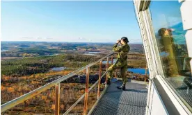  ?? Photograph: NTB/Alamy ?? Private Ema Fazlagic surveys the Norwegian border with Russia, which extends 12 nautical miles out in the Barents Sea.