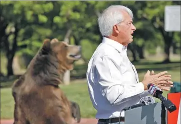  ?? Justin Sullivan Getty Images ?? JOHN COX kicked off his campaign to unseat Gov. Gavin Newsom in California’s recall election with a rally featuring a live bear on Tuesday in Sacramento. Cox, a Republican, lost to Newsom in a landslide in 2018.