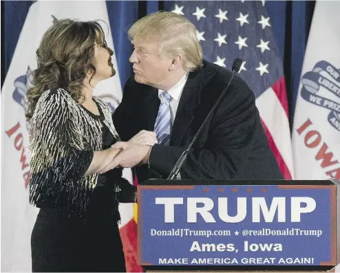  ?? MARY ALTAFFER / THE ASSOCIATED PRESS ?? Former Alaska Gov. Sarah Palin, left, endorses Republican presidenti­al candidate Donald Trump during a rally at the Iowa State University in Ames, Iowa, on Tuesday.
